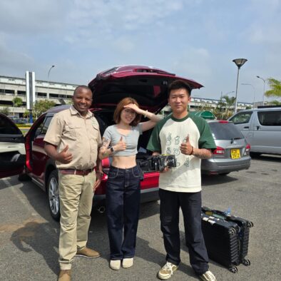 Keshi Tours director John posing with clients before starting their safari adventure
